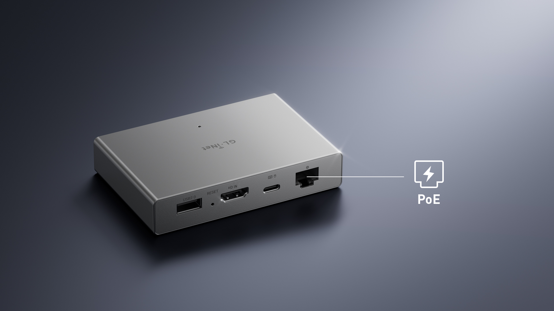 The RM1PE showing the different ports, on a black table.